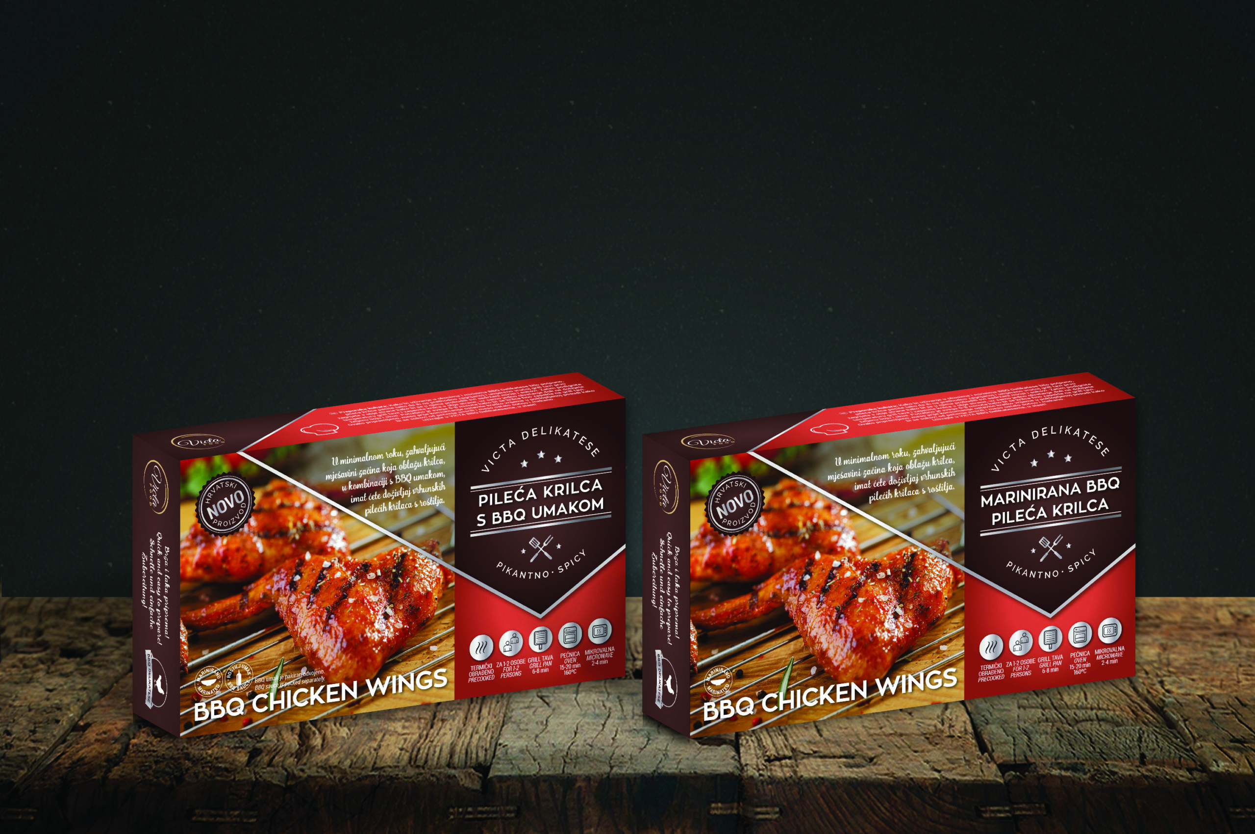 Packaging design for Victa Food company's meat products. The picture shows two product packages on a wooden base with a dark gray background. The design is red with dark brown parts on which there is white text. There is also a picture of the product on the packaging.