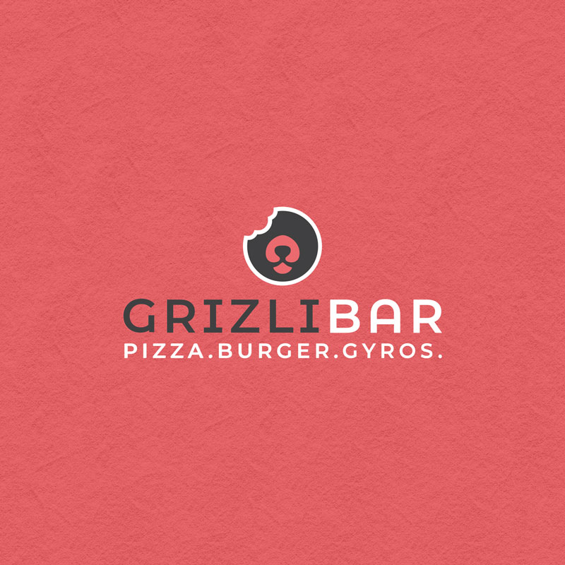 Logo design for Grlizli Bar in Zagreb, Croatia. The image shows the logo on a red surface. The logo icon is a circle with one part bitten off, and in the circle there is a muzzle similar to that of a bear. The circle is black with a white border, and the muzzle is red. Below the icon is the name with Grizzly written in black and Bar in white. Below the name is written in white letters: pizza.burger.gyros.
