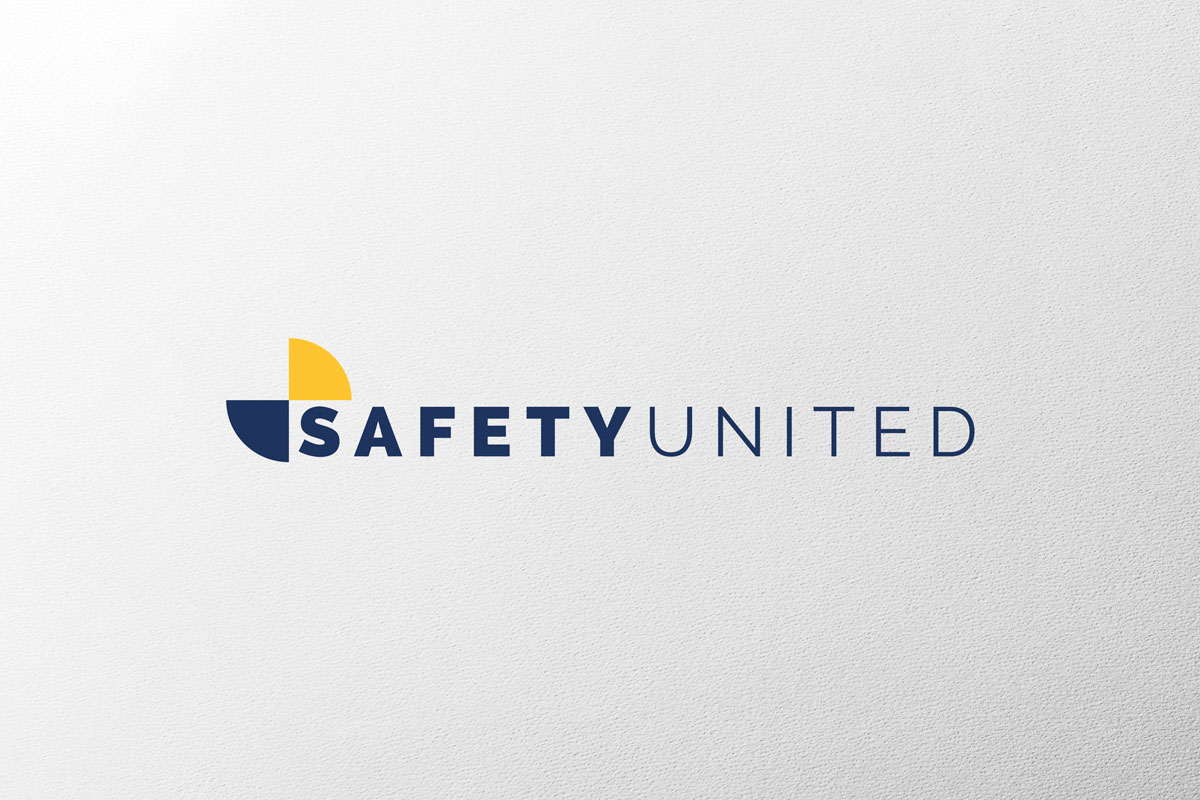 Redesign of the logo for Safety United. The logo is on a white background. The logo is dark blue in capital letters. Safety word is in bold, while united remained thin. The sign is all the triangles that touch near the letter S. One is yellow, the other dark blue.
