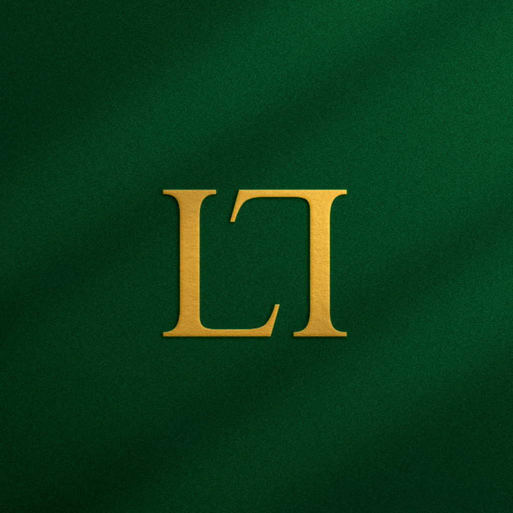 Logo icon for the company Stillist. Golden letters L. 