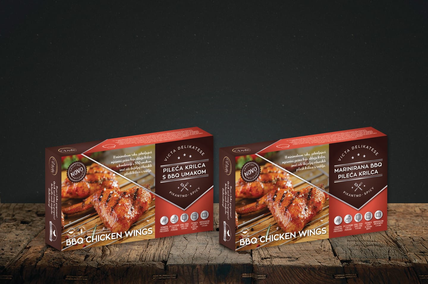 Packaging design for Victa Food meat products: two BBQ Chicken Wings packs in red and dark brown with white text and a product photo, on a wooden surface