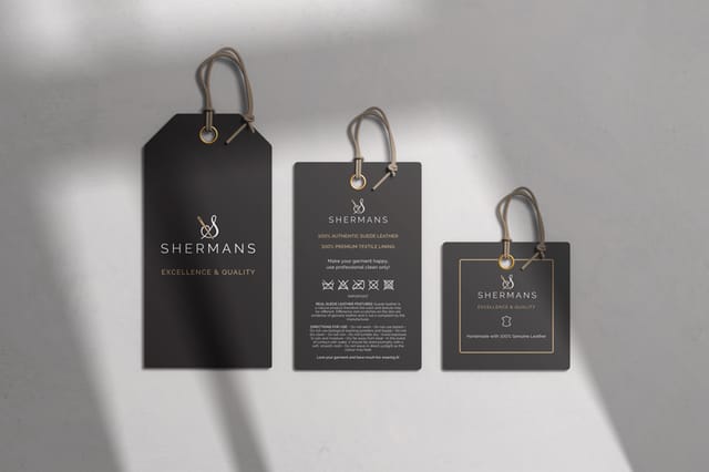 Label design for the fashion brand Shermans: three black hang tags on a white background